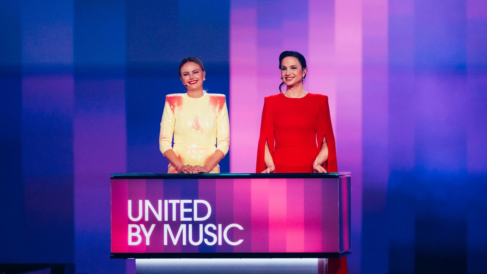 Petra Mede and Malin Åkerman hosting the Second Semi-Final of the 68th Eurovision Song Contest at Malmö Arena