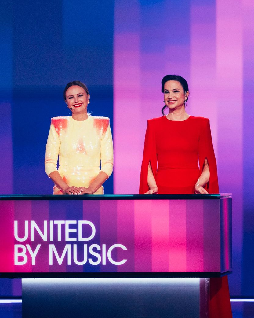 Petra Mede and Malin Åkerman hosting the Second Semi-Final of the 68th Eurovision Song Contest at Malmö Arena