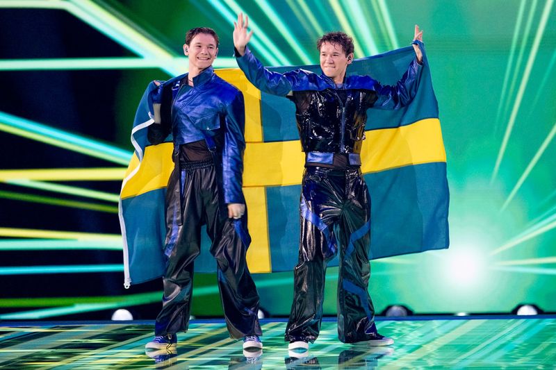 Sweden's Marcus & Martinus walk the Flag Parade at the Grand Final in Malmö Arena