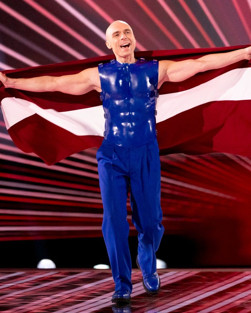 Dons representing Latvia, walking the Flag Parade at the Grand Final in Malmö Arena