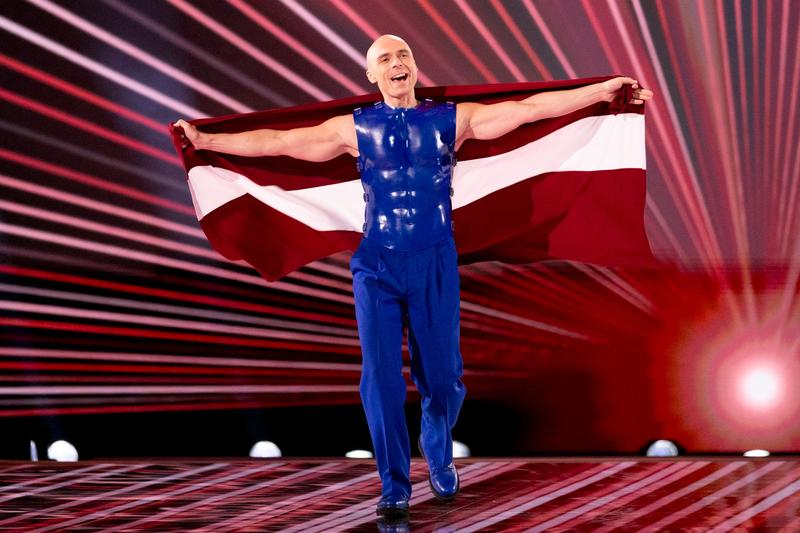 Dons representing Latvia, walking the Flag Parade at the Grand Final in Malmö Arena
