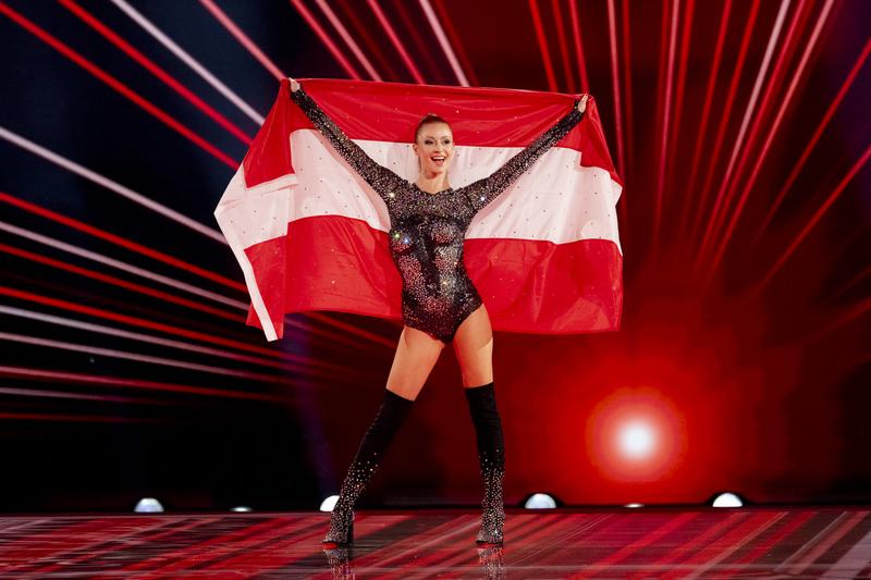 Kaleen walking the Flag Parade for Austria at the Grand Final in Malmö Arena