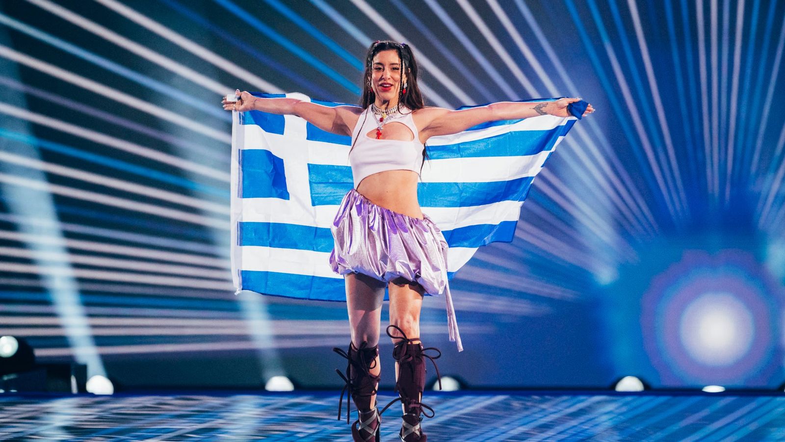 Marina Satti walks the Flag Parade for Greece at the Grand Final in Malmö Arena