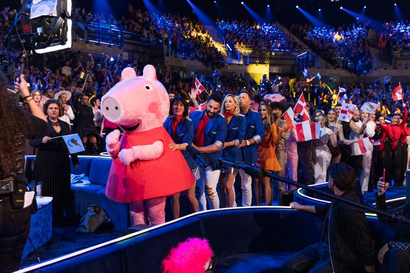 Peppa Pig leads a Conga Line in the Green Room during the Eurovision 2023 Second Semi-Final in Liverpool
