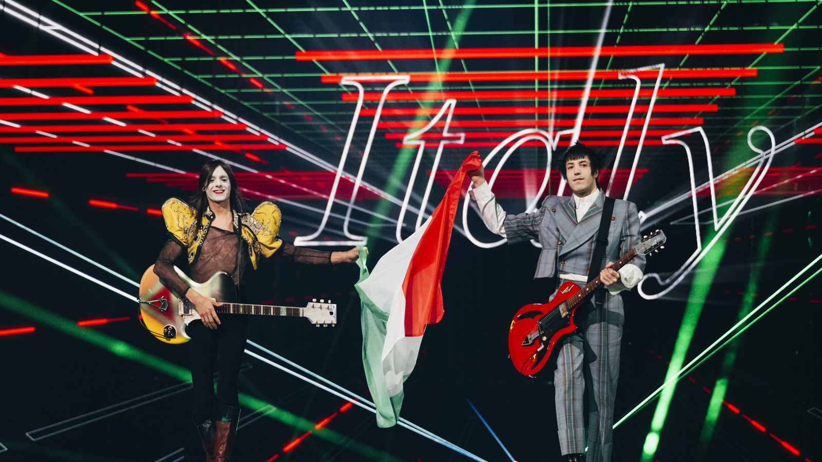 Lucio Corsi walking the Basel 2025 Flag Parade for Italy with Tommaso Ottomano