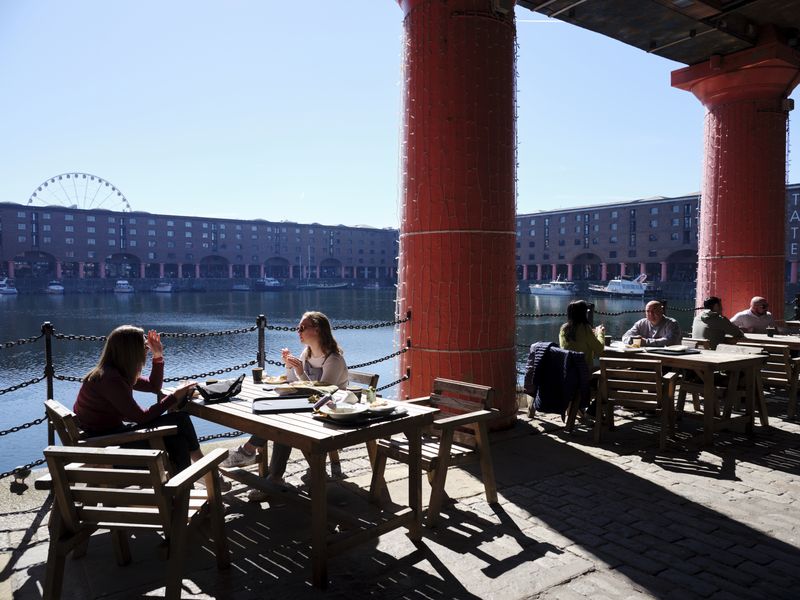 IMAGE CAPTION: Soak up the sun in between seeing the sights at one of the many dockside cafes or bars.