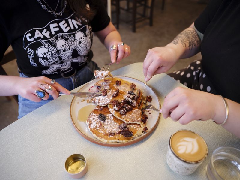Tuck into fluffy pancakes at Liverpool's Lovelocks Coffee Shop. Image credit: Nic Bezzina, provided by Booking.com.