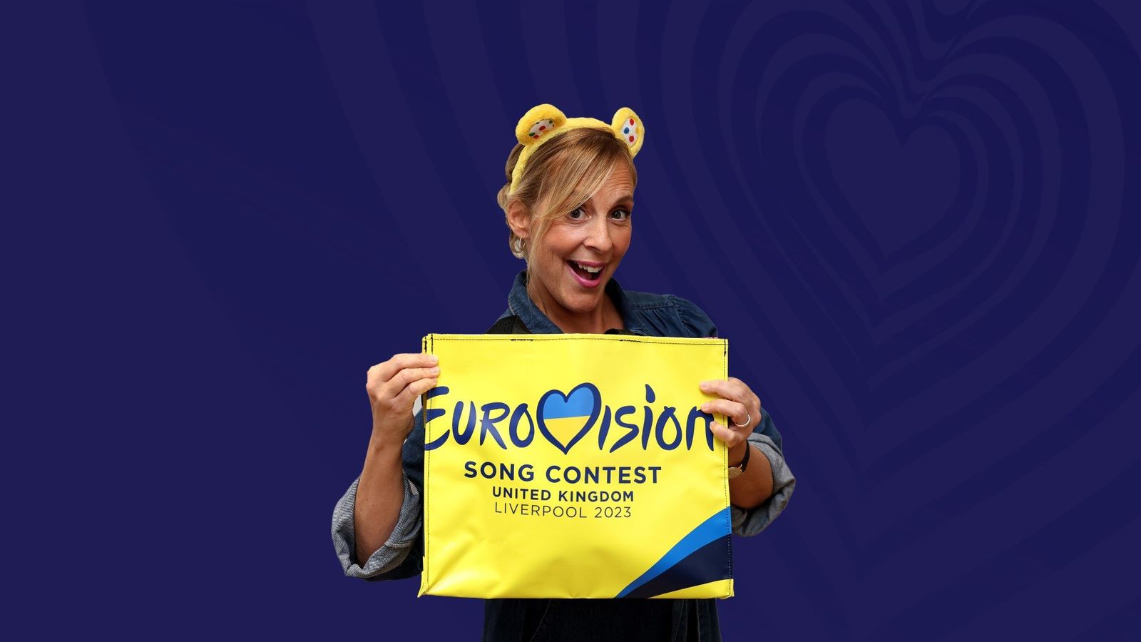 Mel Giedroyc showing off a one-of-a-kind Liverpool 2023 bag